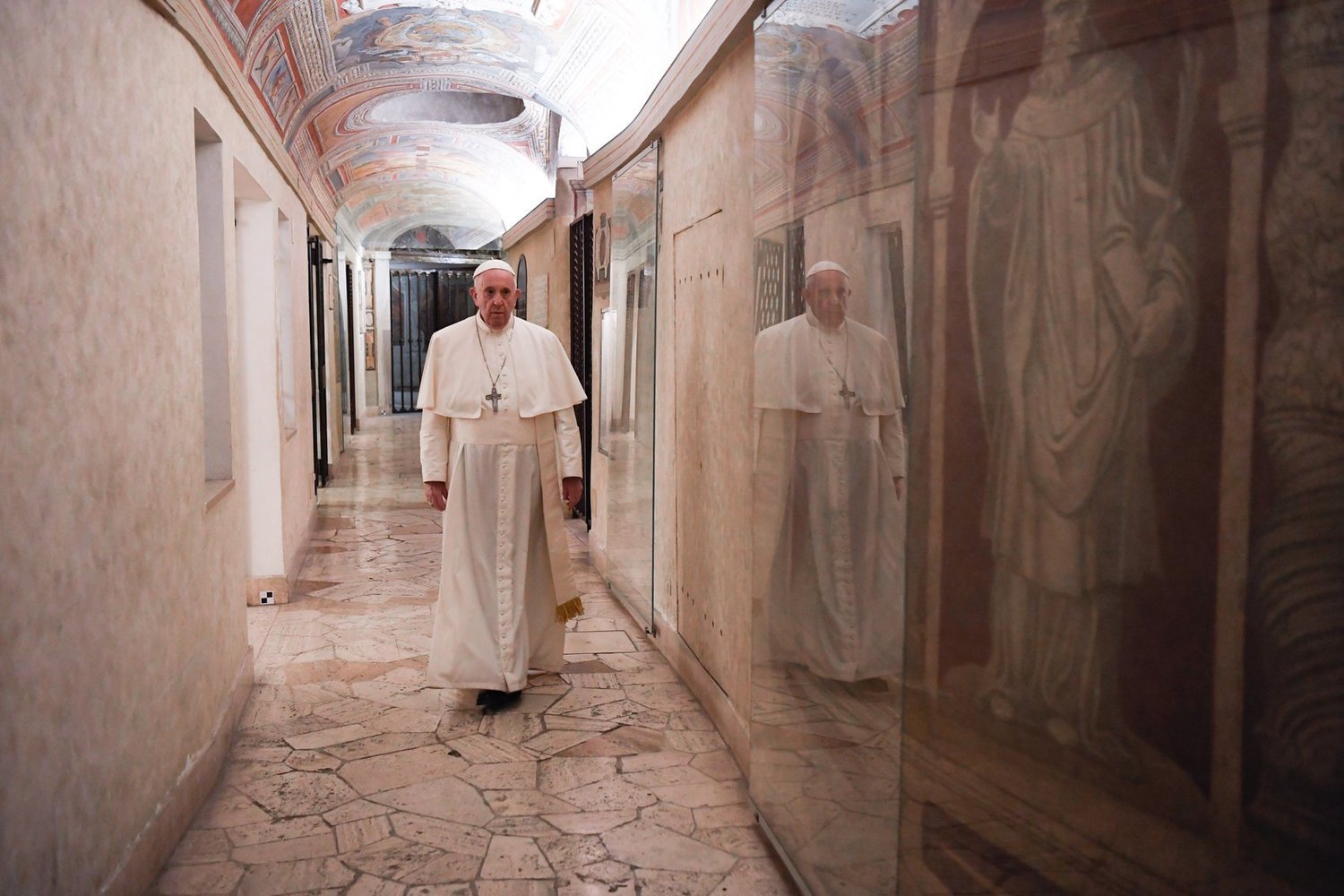 Pope Francis walks through the crypt of St. Peter's Basilica as he visits the tombs of deceased popes at the Vatican on All Souls' Day, Nov. 2, 2020. In a 2023 interview marking the 10th anniversary of his election, the 86-year-old pope said he thinks about death often, but it is a good think to remember one will not live forever. (CNS photo/Vatican Media)